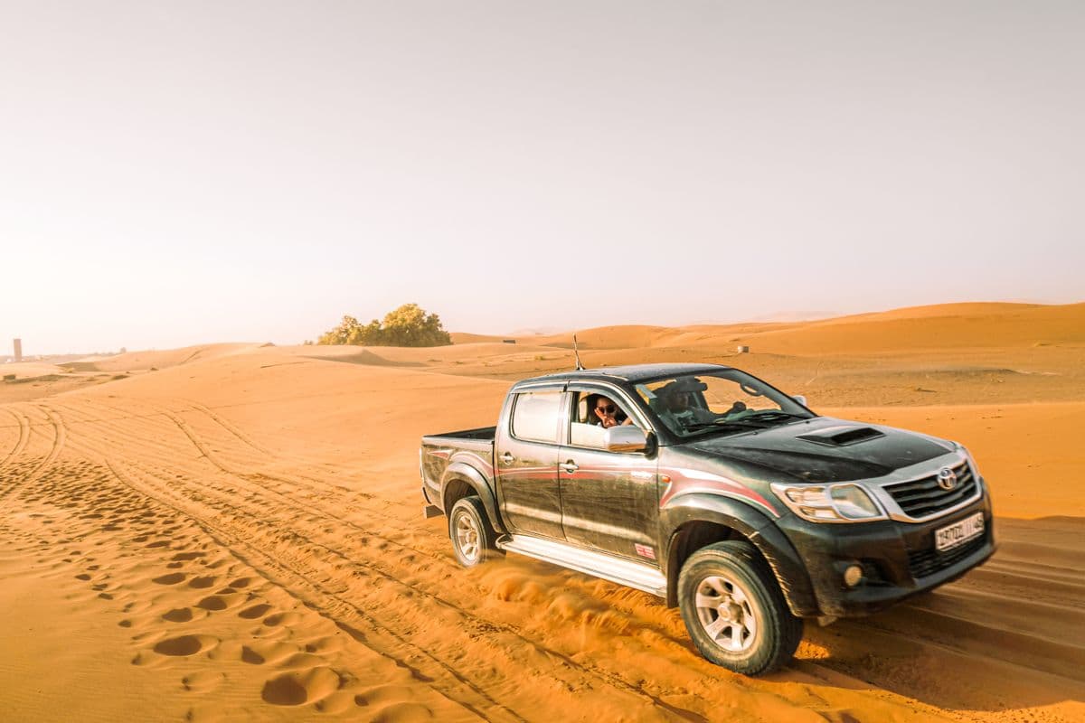 Pickup truck on a desert track, the type of vehicle typically used by an independent trucker